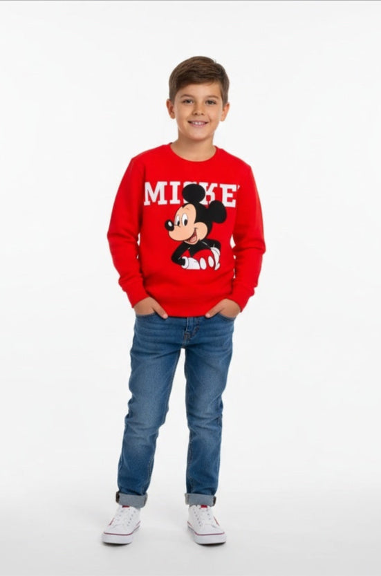 Child wearing a red Mickey Mouse sweatshirt on a white background