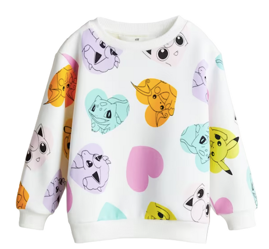 White sweatshirt with colorful Pokemon patterns on a white background